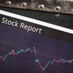 Detailed view of a stock report displaying a market performance graph with data trends. — Photo by RDNE Stock project on Pexels