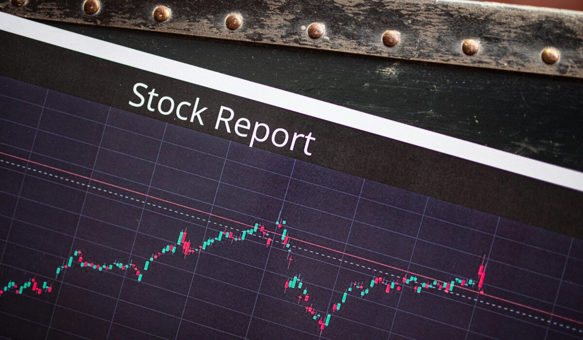 Detailed view of a stock report displaying a market performance graph with data trends. — Photo by RDNE Stock project on Pexels