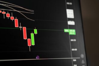 Candlestick chart showing a downward trend in the stock market analysis. — Photo by Alex Luna on Pexels