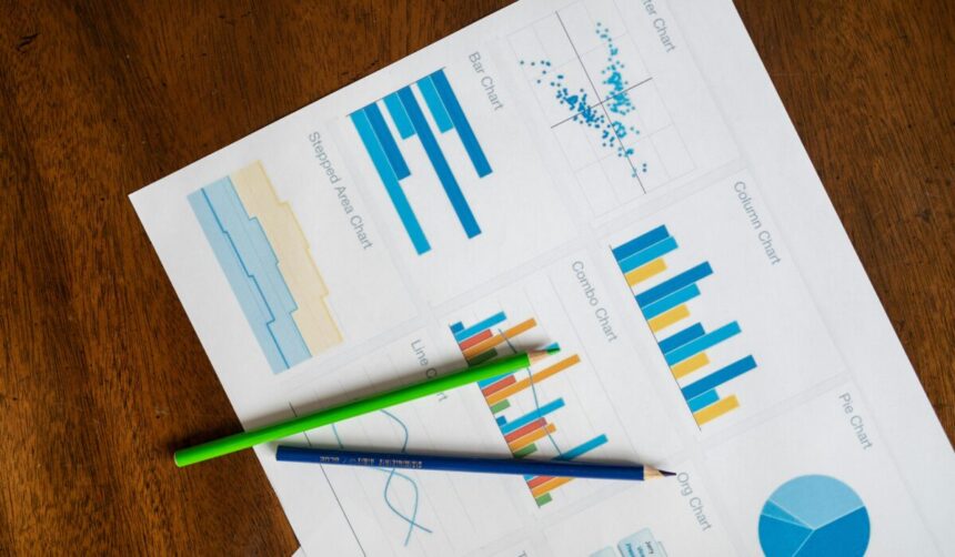Top view of vibrant charts and colored pencils on wooden surface. — Photo by RDNE Stock project on Pexels