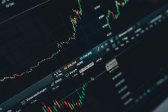 Close-up of stock market trading screen displaying financial growth and charts. — Photo by Alesia Kozik on Pexels
