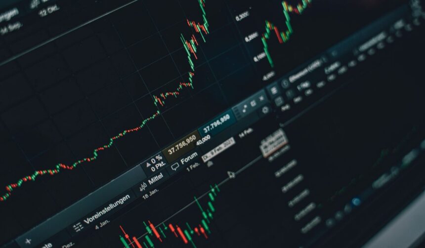 Close-up of stock market trading screen displaying financial growth and charts. — Photo by Alesia Kozik on Pexels